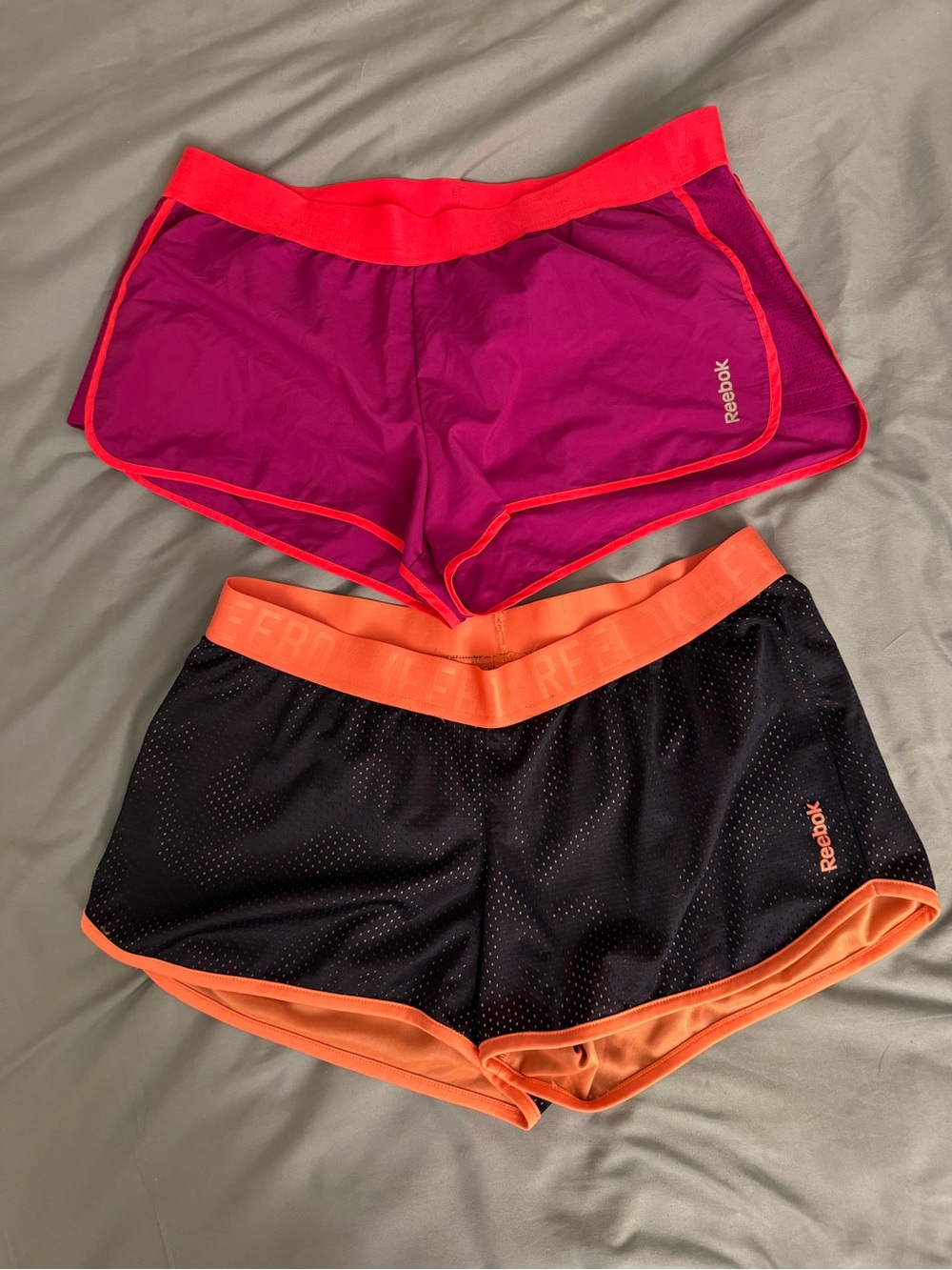 Reebok Women’s Purple & Black Athletic Shorts with Orange Trim